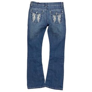 Angel winged pocket flare jeans